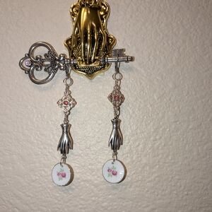 Silver Key and Hand Earrings with Floral Accents